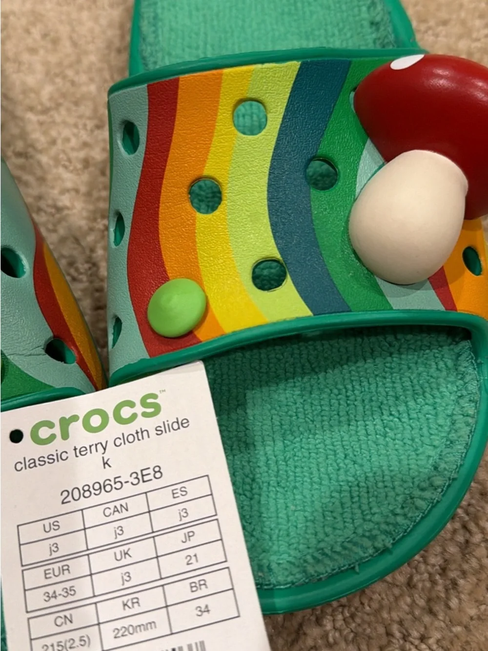 CROCS Kids Teal Slide Sandals with Rainbow Stripes